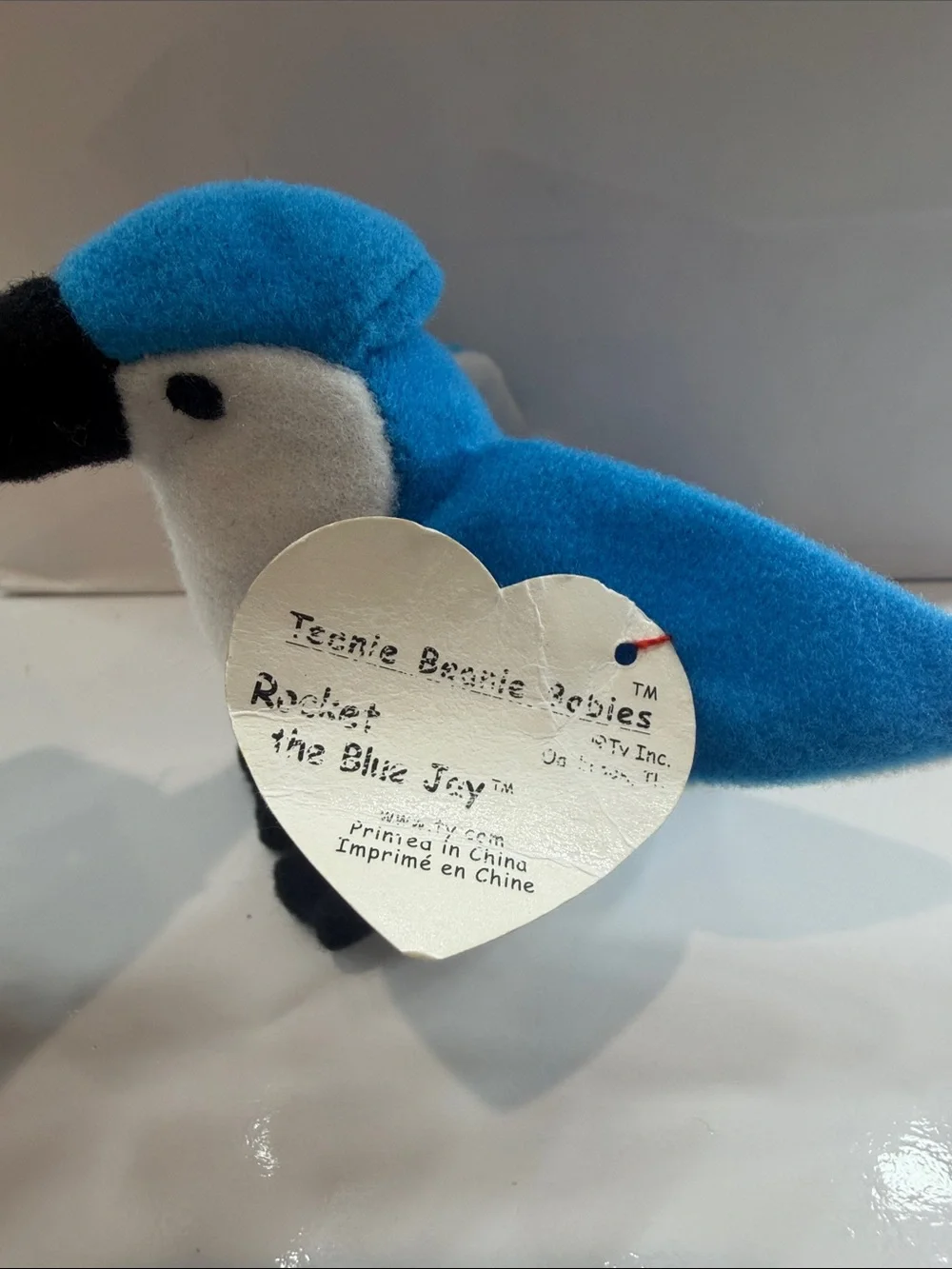 Valuable Ty Blue White and Black Plush Parrot Toy